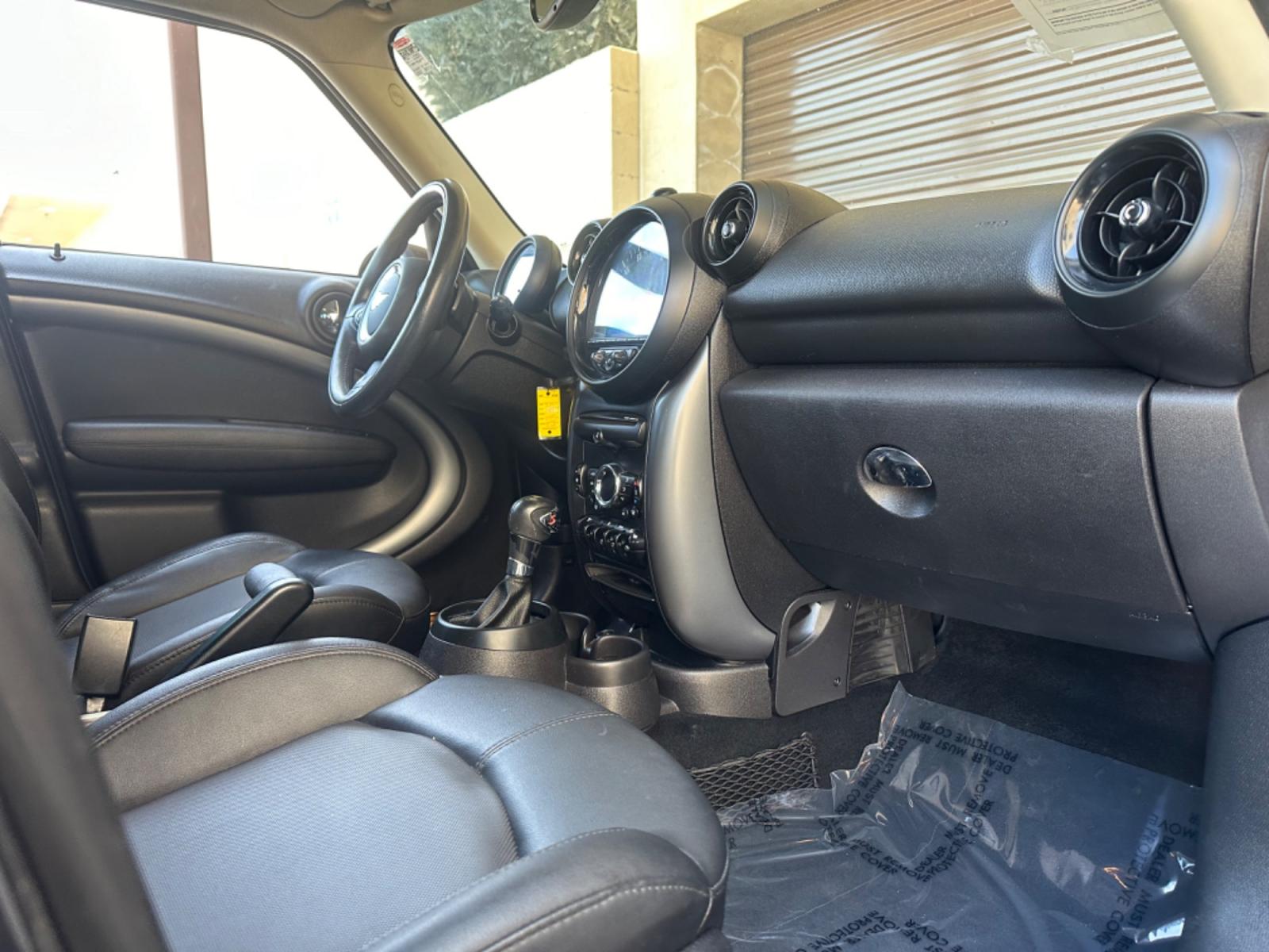 2015 Black /Black Mini Countryman S (WMWZC3C54FW) with an 1.6L L4 DOHC 16V TURBO engine, Automatic transmission, located at 30 S. Berkeley Avenue, Pasadena, CA, 91107, (626) 248-7567, 34.145447, -118.109398 - Photo #24